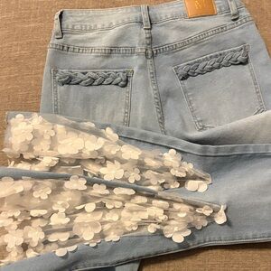 Women’s Boutique light blue Flare Jeans with Floral Accent